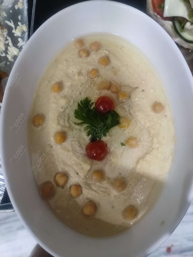 Tasty Hummus Dip cooked by COOX chefs cooks during occasions parties events at home