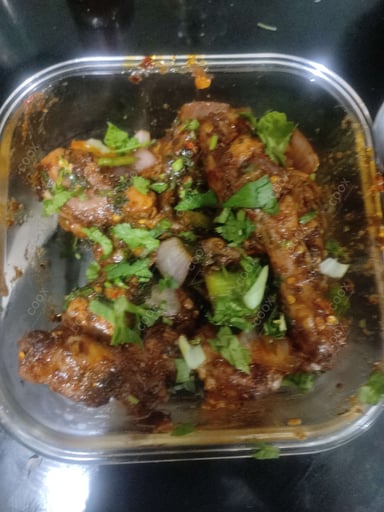 Tasty Chicken In Burnt Garlic Sauce cooked by COOX chefs cooks during occasions parties events at home