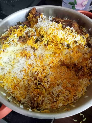 Tasty Mutton Biryani cooked by COOX chefs cooks during occasions parties events at home