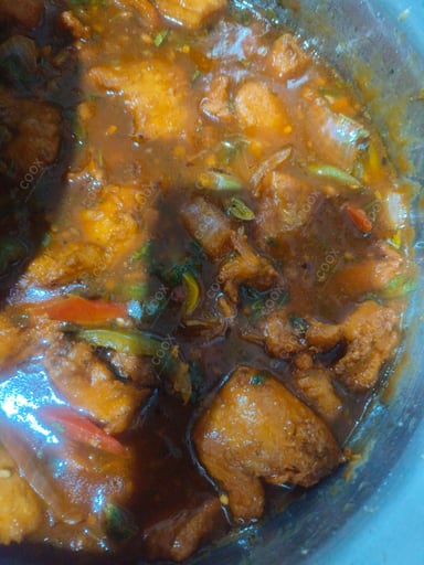 Tasty Chicken In Burnt Garlic Sauce cooked by COOX chefs cooks during occasions parties events at home