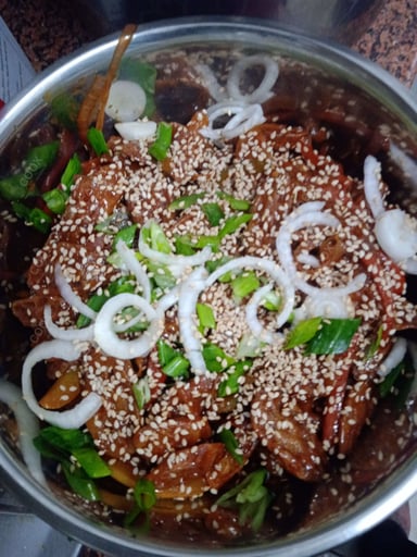 Tasty Chilli Lotus Stem cooked by COOX chefs cooks during occasions parties events at home