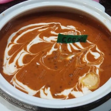 Tasty Dal Makhni cooked by COOX chefs cooks during occasions parties events at home