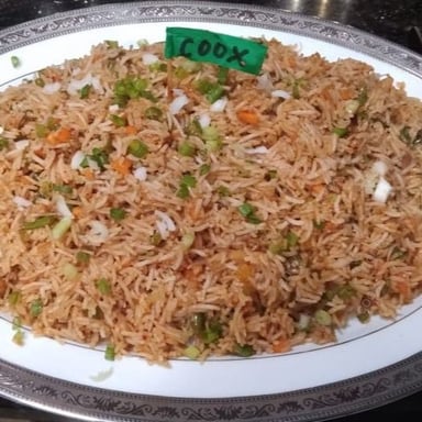 Tasty Veg Fried Rice cooked by COOX chefs cooks during occasions parties events at home