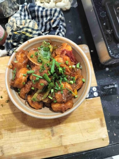 Tasty Red Chilli Prawns cooked by COOX chefs cooks during occasions parties events at home