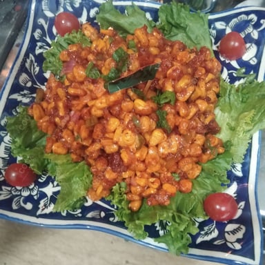 Tasty Corn Chaat cooked by COOX chefs cooks during occasions parties events at home