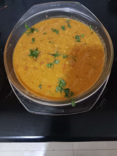 Tasty Chana Dal cooked by COOX chefs cooks during occasions parties events at home