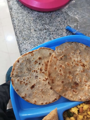 Tasty Stuffed Paranthas cooked by COOX chefs cooks during occasions parties events at home