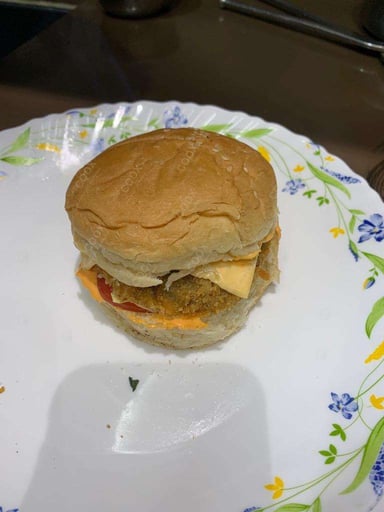 Tasty Mini Veg Burgers cooked by COOX chefs cooks during occasions parties events at home