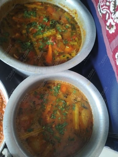 Tasty Sambhar cooked by COOX chefs cooks during occasions parties events at home