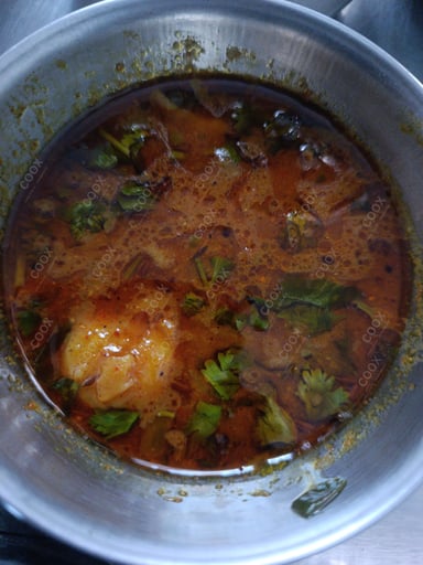 Tasty Aloo Rasedar cooked by COOX chefs cooks during occasions parties events at home