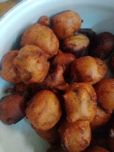 Tasty Aloo Bonda cooked by COOX chefs cooks during occasions parties events at home