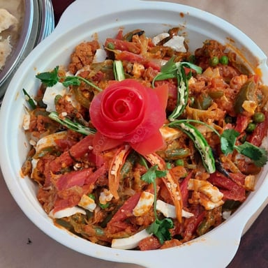 Tasty Veg Jalfrezi cooked by COOX chefs cooks during occasions parties events at home