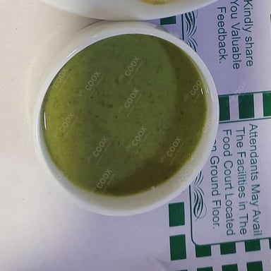 Tasty Green Chutney cooked by COOX chefs cooks during occasions parties events at home