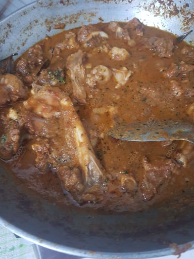 Tasty Mutton Korma cooked by COOX chefs cooks during occasions parties events at home