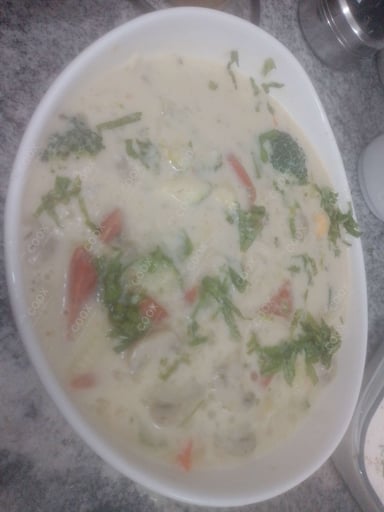 Tasty Green Thai Curry cooked by COOX chefs cooks during occasions parties events at home