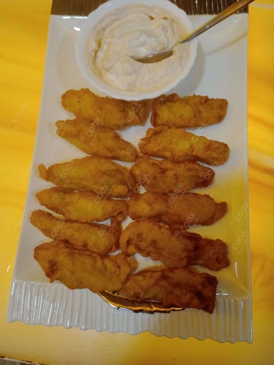 Tasty Fish Orly cooked by COOX chefs cooks during occasions parties events at home