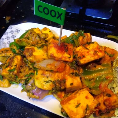 Tasty Paneer Tikka cooked by COOX chefs cooks during occasions parties events at home