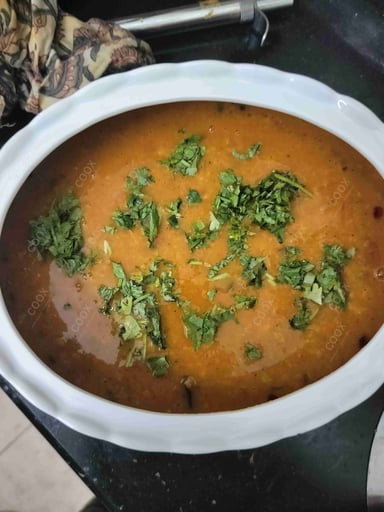 Tasty Arhar Dal cooked by COOX chefs cooks during occasions parties events at home