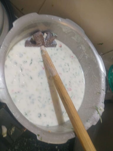 Tasty Cucumber Raita cooked by COOX chefs cooks during occasions parties events at home