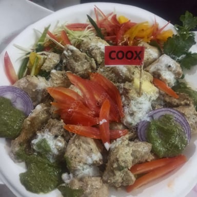 Tasty Murgh Malai Tikka cooked by COOX chefs cooks during occasions parties events at home