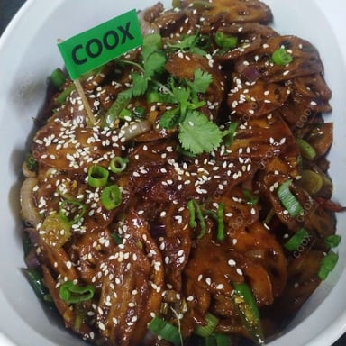 Tasty Chilli Lotus Stem cooked by COOX chefs cooks during occasions parties events at home
