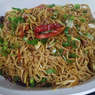 Tasty Veg Hakka Noodles cooked by COOX chefs cooks during occasions parties events at home