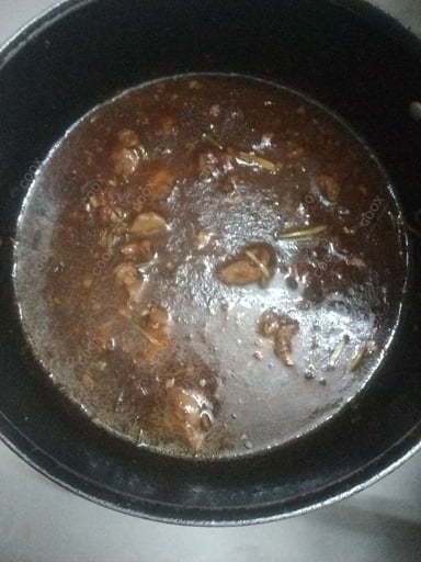 Tasty Chicken In Burnt Garlic Sauce cooked by COOX chefs cooks during occasions parties events at home