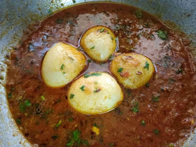 Tasty Egg Curry cooked by COOX chefs cooks during occasions parties events at home