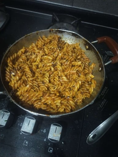 Tasty Pasta in Red Sauce cooked by COOX chefs cooks during occasions parties events at home
