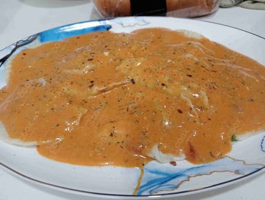 Tasty Ravioli in Pink Sauce cooked by COOX chefs cooks during occasions parties events at home