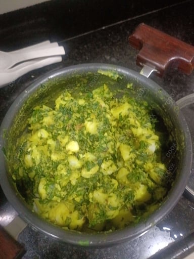 Tasty Aloo Methi cooked by COOX chefs cooks during occasions parties events at home