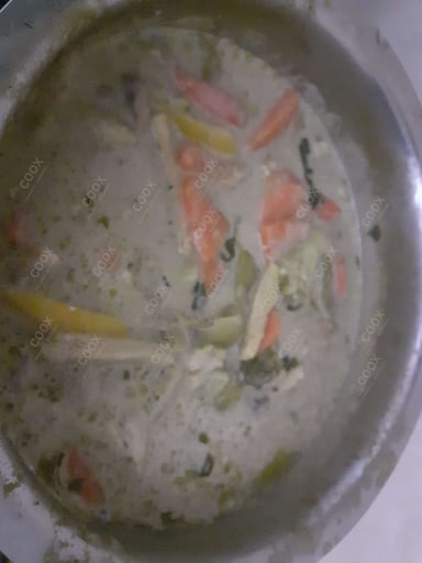 Tasty Green Thai Curry cooked by COOX chefs cooks during occasions parties events at home