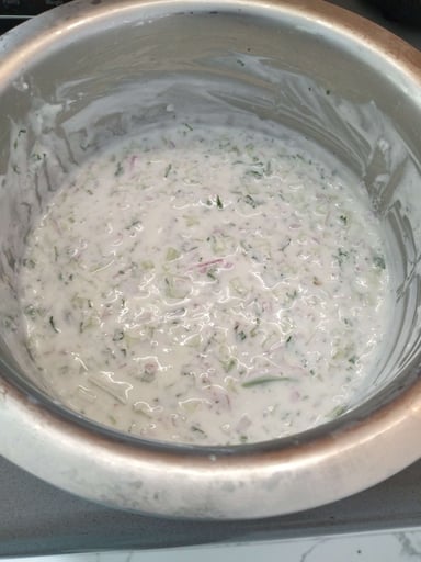 Tasty Cucumber Raita cooked by COOX chefs cooks during occasions parties events at home