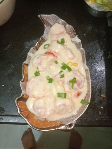 Tasty Butter Garlic Prawns cooked by COOX chefs cooks during occasions parties events at home