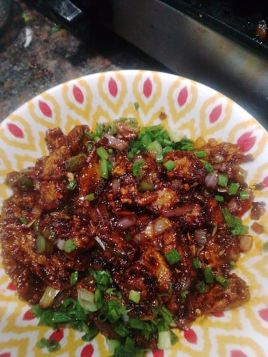 Tasty Chilli Lotus Stem cooked by COOX chefs cooks during occasions parties events at home