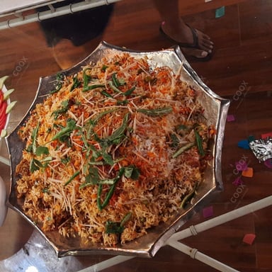 Tasty Veg Biryani cooked by COOX chefs cooks during occasions parties events at home