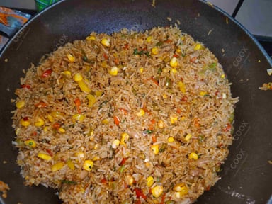 Tasty Mexican Rice cooked by COOX chefs cooks during occasions parties events at home