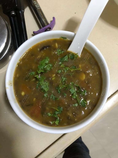 Tasty Masoor Dal  cooked by COOX chefs cooks during occasions parties events at home