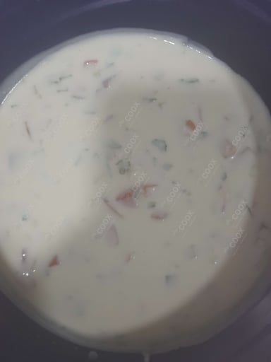 Tasty Cucumber Raita cooked by COOX chefs cooks during occasions parties events at home