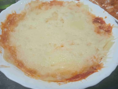 Tasty Chicken Lasagna cooked by COOX chefs cooks during occasions parties events at home
