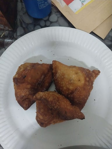 Tasty Keema Samosas cooked by COOX chefs cooks during occasions parties events at home
