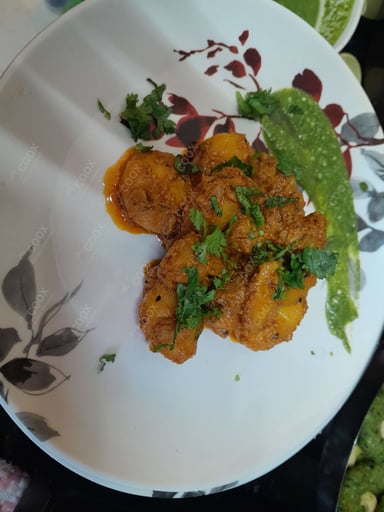 Tasty Aloo Chaat cooked by COOX chefs cooks during occasions parties events at home