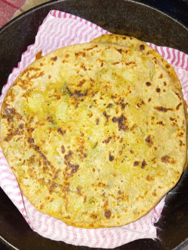 Tasty Stuffed Paranthas cooked by COOX chefs cooks during occasions parties events at home