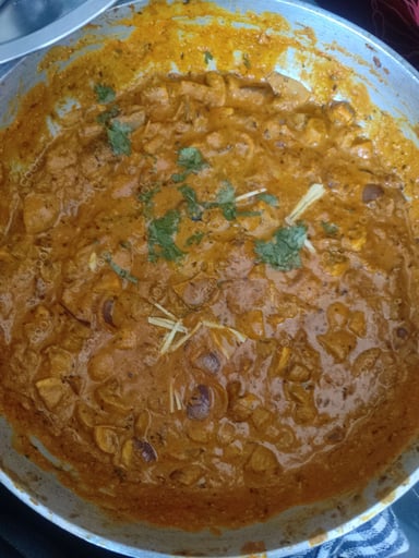 Tasty Mushroom do Pyaza cooked by COOX chefs cooks during occasions parties events at home