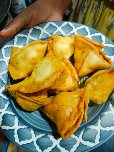 Tasty Keema Samosas cooked by COOX chefs cooks during occasions parties events at home