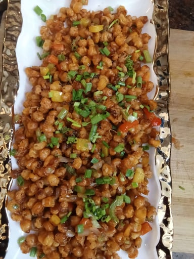 Tasty Crispy Chilli Baby Corn cooked by COOX chefs cooks during occasions parties events at home