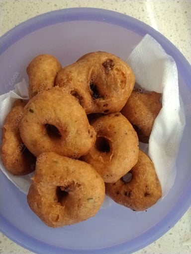 Tasty Medu Vada cooked by COOX chefs cooks during occasions parties events at home