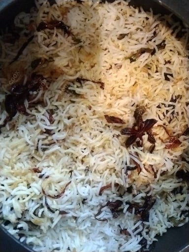 Tasty Mutton Biryani cooked by COOX chefs cooks during occasions parties events at home