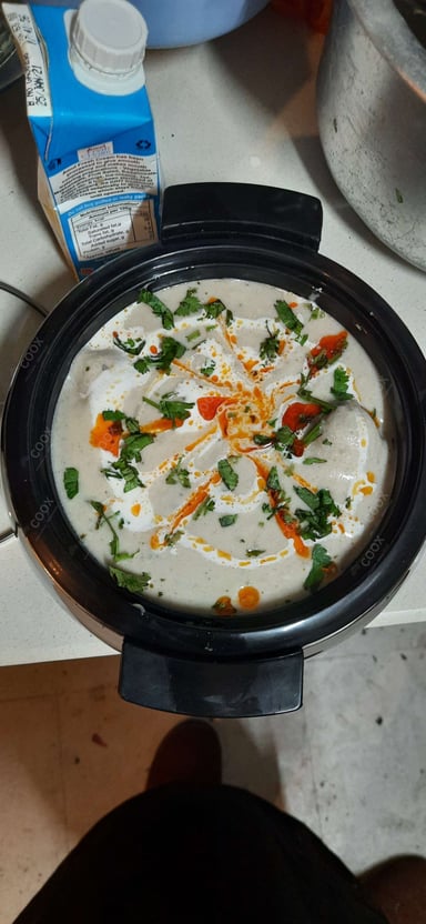 Tasty Malai Kofta (Orange Gravy) cooked by COOX chefs cooks during occasions parties events at home