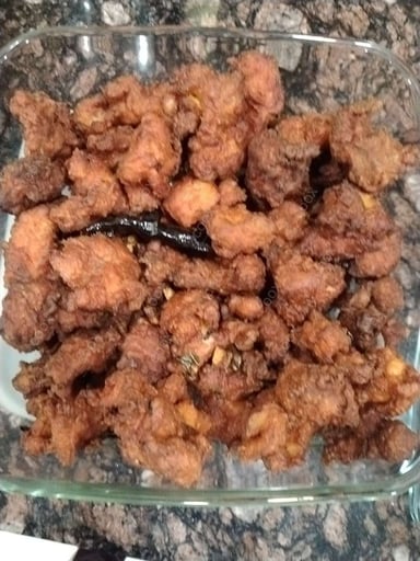 Tasty Chicken 65 cooked by COOX chefs cooks during occasions parties events at home